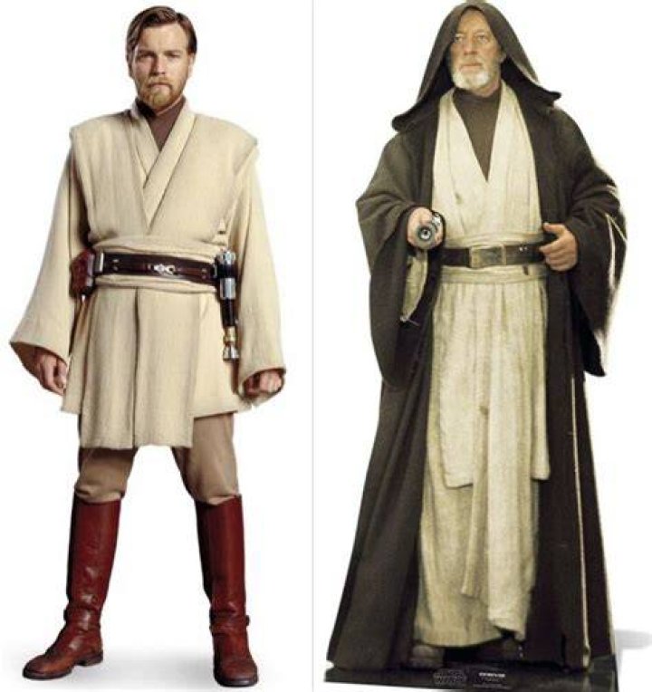 Obi-Wan Kenobi on Tatooine, wearing a hood, under colourful sunset clouds