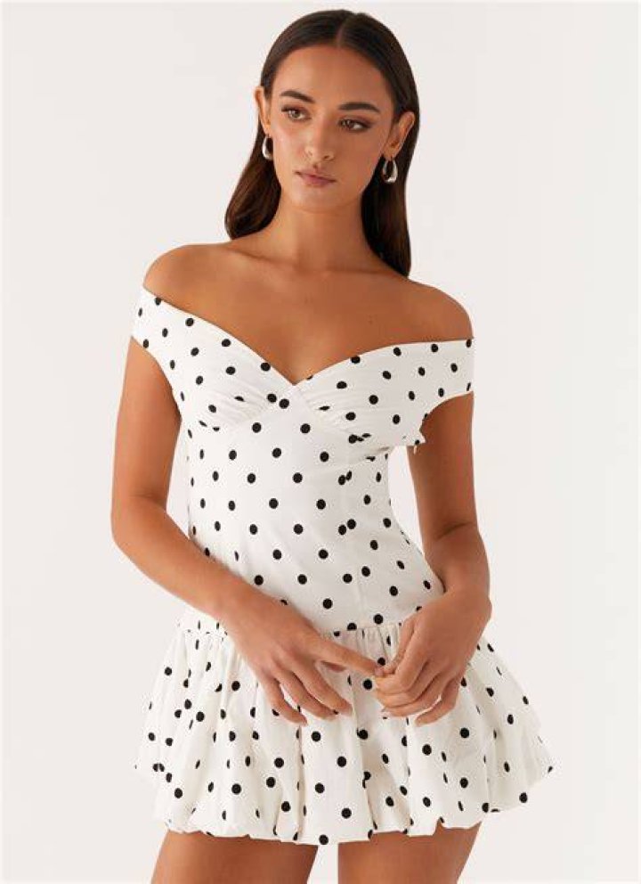 Off-shoulder cotton-poplin mini with a flouncy bubble skirt and off-shoulder drapes