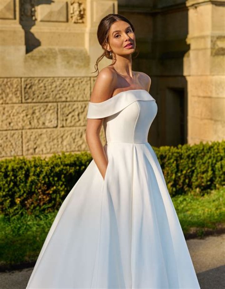 Off-shoulder tiered tulle gown with sweetheart neckline