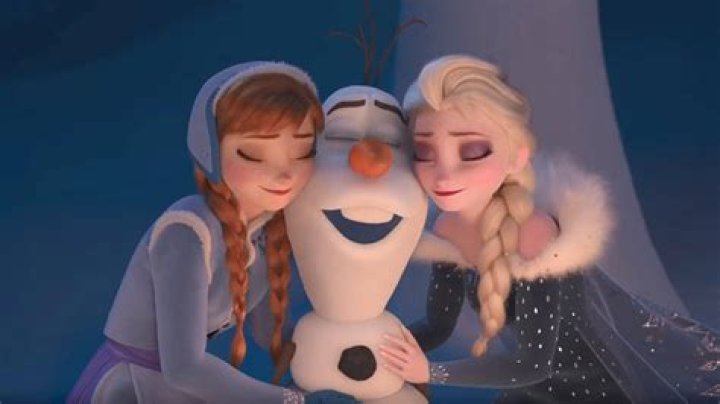 Olaf with Anna and Elsa in Olaf's Frozen Adventure trailer