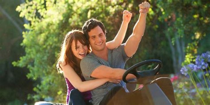 Olive and Todd Riding off on a lawnmower in Easy A