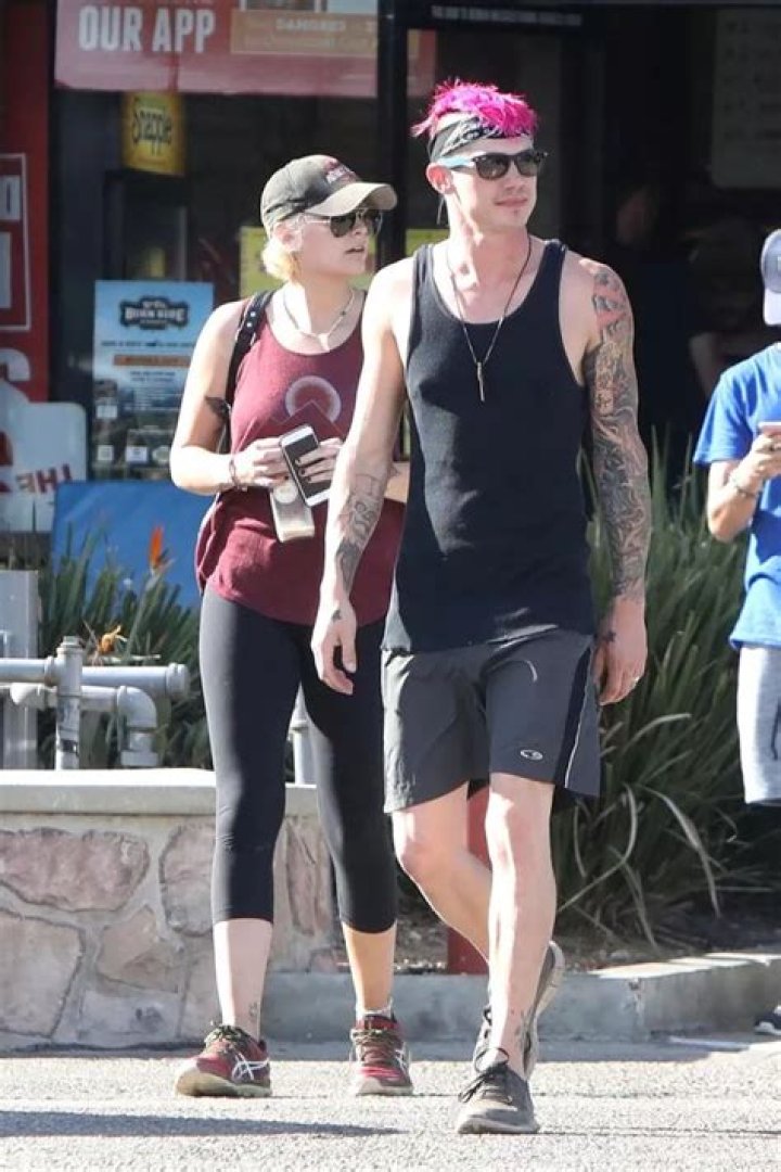 Paris Jackson and boyfriend Michael Snoddy hold hands during lovedup