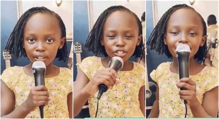 Photos of a girl singig with a microphone in her hand. Photos of a girl singig with a microphone in her hand.