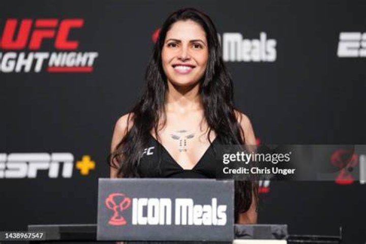  Polyana Viana of Brazil poses on the scale during the UFC 227 weigh-in in Los Angeles. Photo / Getty
