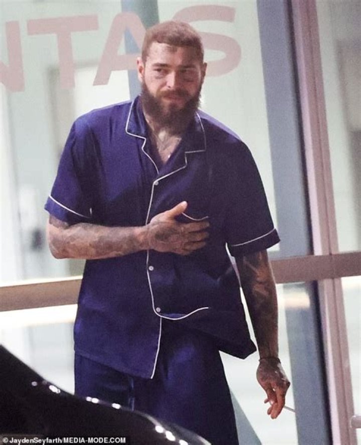 Post Malone touches down in Sydney with girlfriend and baby daughter
