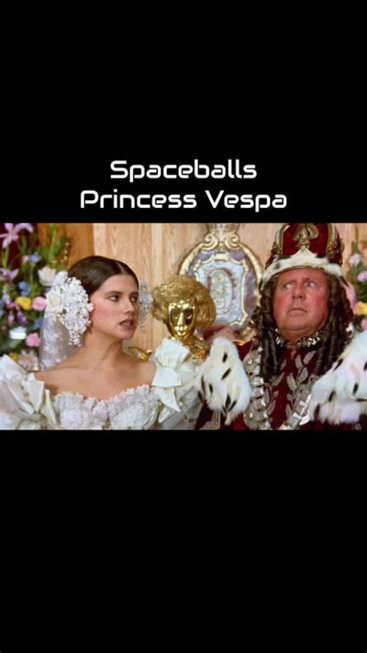 Princess Vespa with gun, Dot in background in Spaceballs