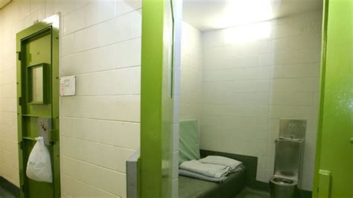 Prisoner grabs police officer's testicles and squeezes during melee in cells