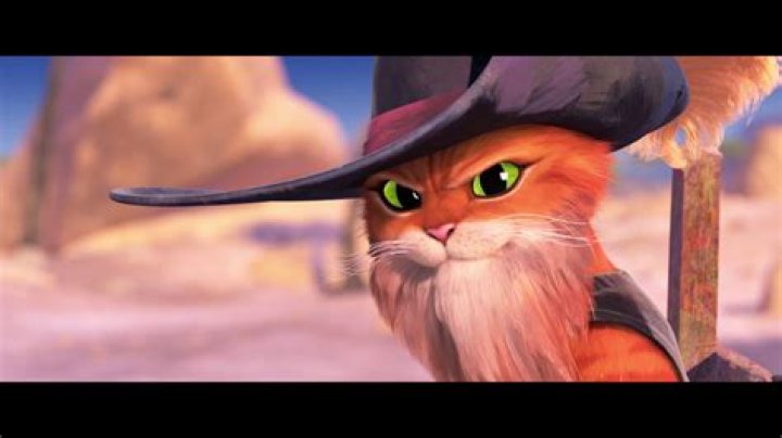 Puss in Boots looking at a note in The Last Wish