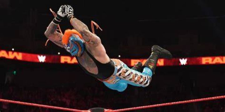 Rey Mysterio hitting a splash