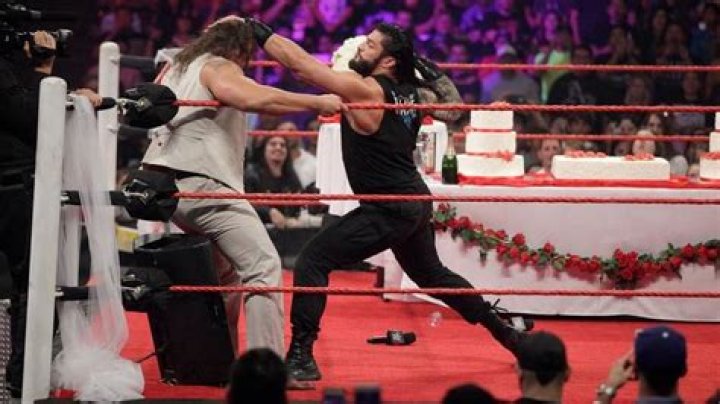 Roman is punching Rusev 