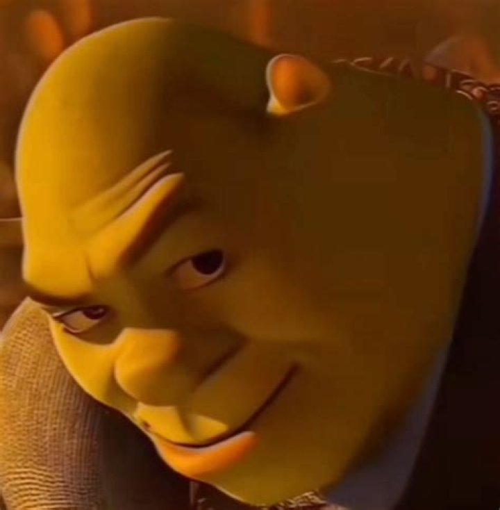 Sakon smirking at the camera. Ukon's head is visible over his shoulder.