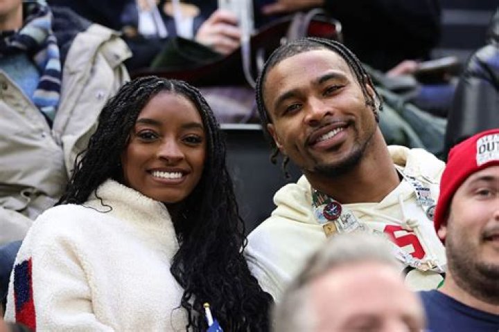 Simone Biles And Jonathan Owens Get Frisky At NFL Game