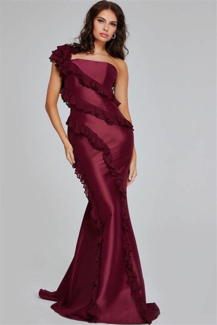 Sleeveless asymmetric ruffled fishtail gown with V-neck