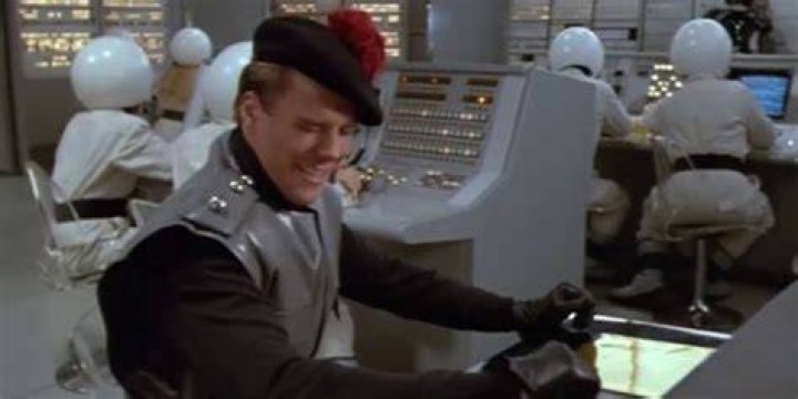 Snotty at his control panel in Spaceballs