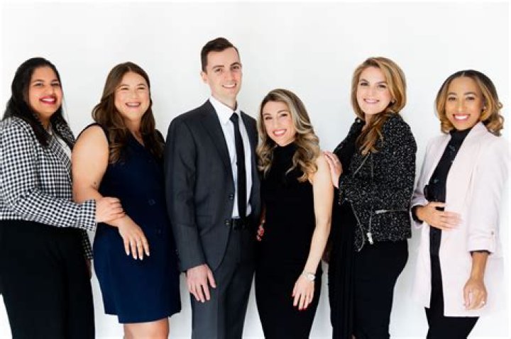 The legal team of L.A. Law staring into the camera.