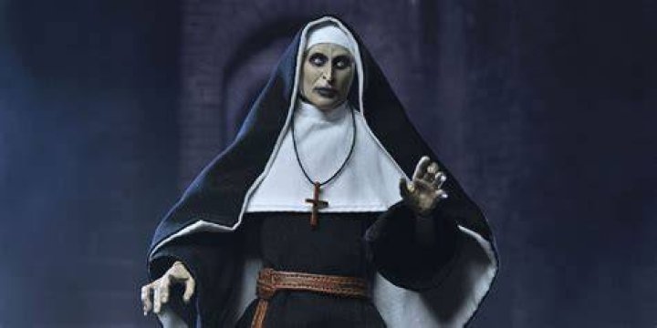 The Nun in a hallway.