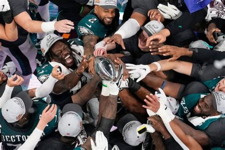 The Philadelphia Eagles coming out on the field in Madden 24. 