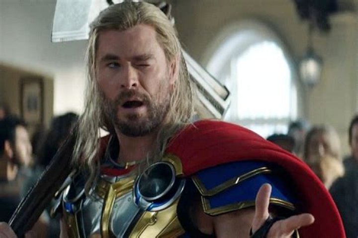 Thor reaches for Mjölnir in Love and Thunder.