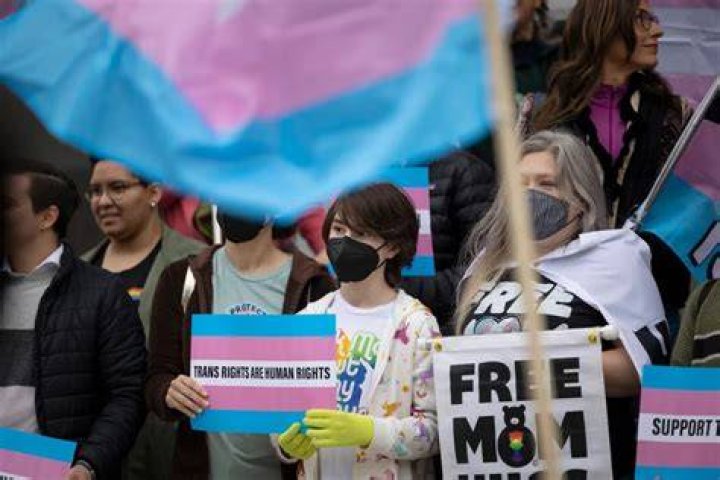 Trans-rights supporters move their attention to the Destiney Church rally in Aotea Square. Photo / Dean Purcell