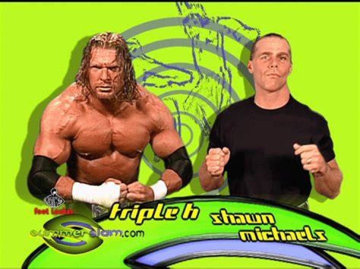 Triple H hugging Shawn Michaels