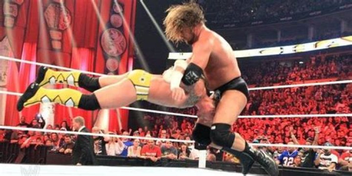 Triple H Pedigrees CM Punk at WWE Night of Champions 2011.