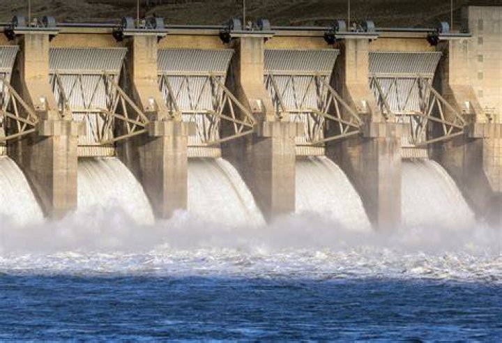 Water breaks through the dam at Braskereidfoss, Norway. Photo / AP