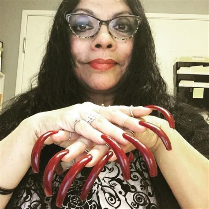 Woman with long fingernails Woman with long fingernails