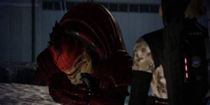 Wrex threatens Shepard with his gun on Virmire in Mass Effect