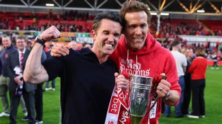 Wrexham co-owners Rob McElhenney, left, and Ryan Reynolds in the stands during the National League football match between Wrexham and Boreham Wood. Photo / AP