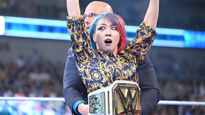 WWE Superstar Asuka Celebrates Winning The Raw Women's Championship