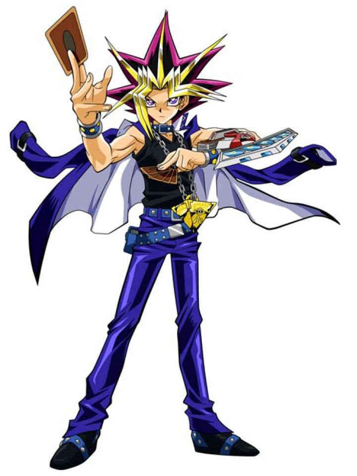 Yami Yugi holding a duel monster card in Yu-Gi-Oh season 0