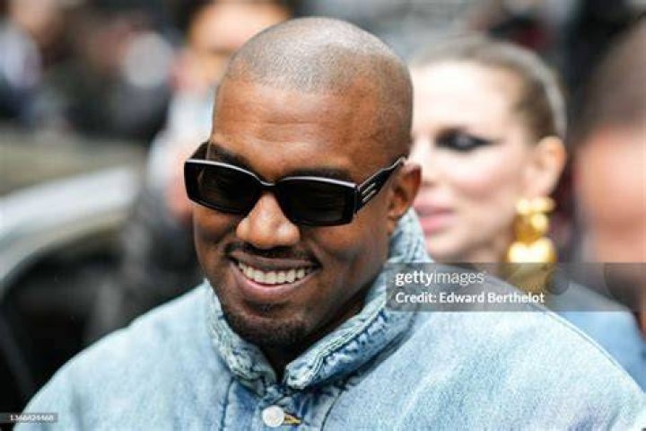 Ye is seen, outside Kenzo, during Paris Fashion Week
