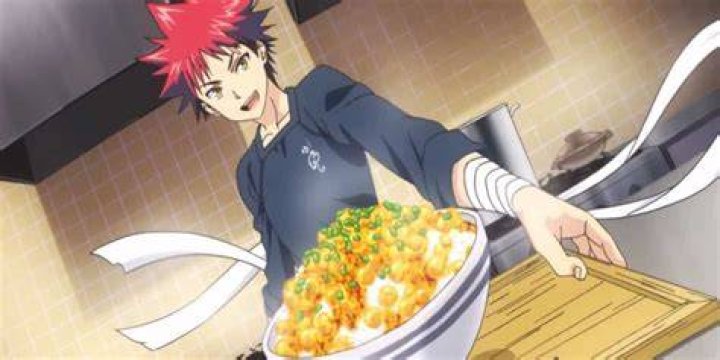 Yukihira from Food Wars serving a delicious dish and looking at the camera
